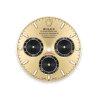 DAYTONA COSMOGRAPH | Gold dial with luminescent black accents
